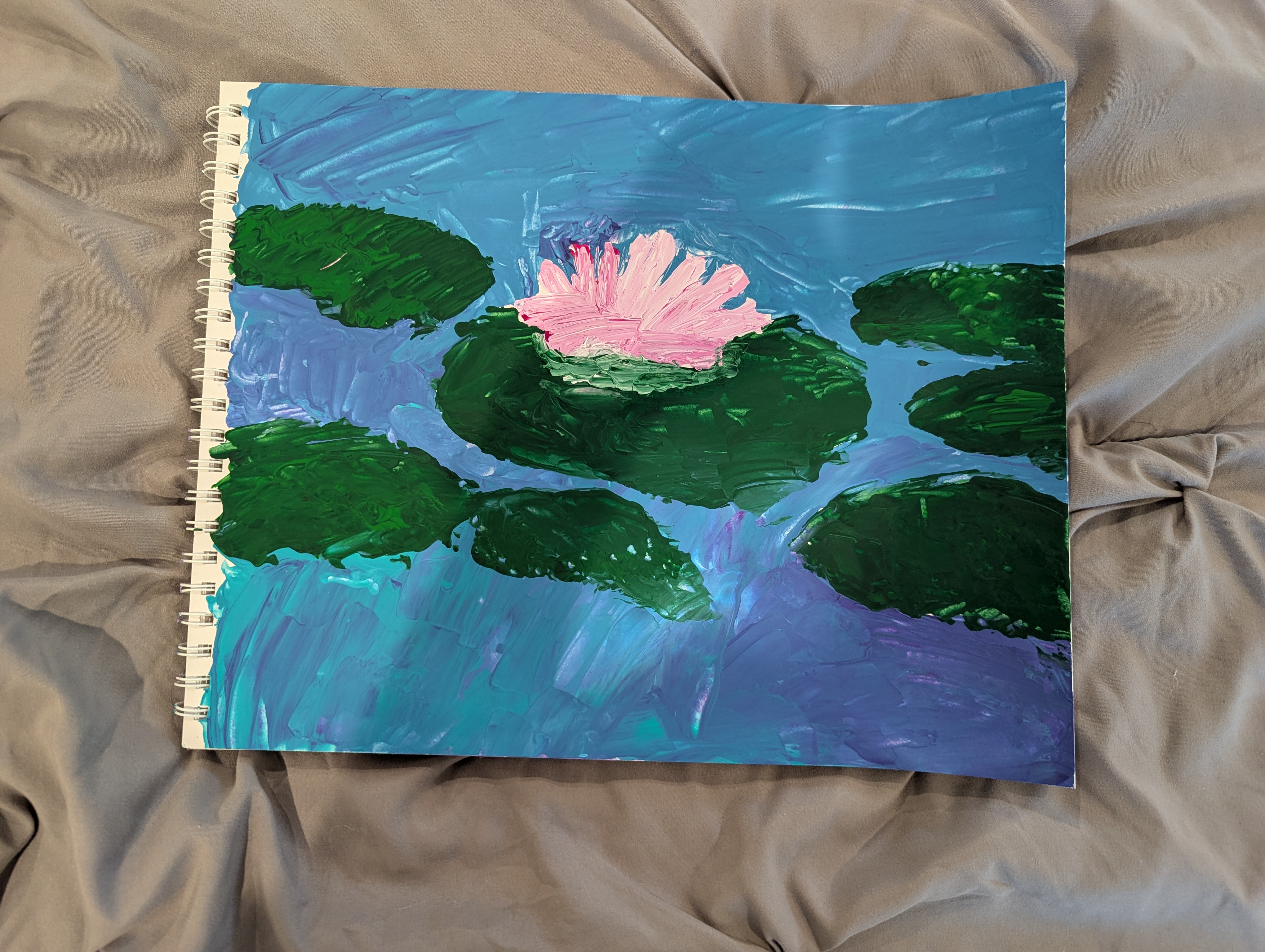 A painting of a lily and lilypads in a lake